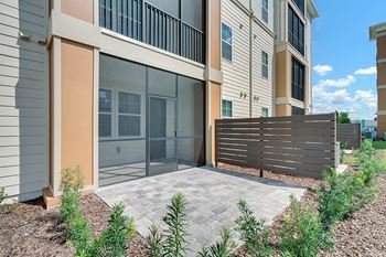 a view of the entrance to a building at the falls at rolland park apartments in b